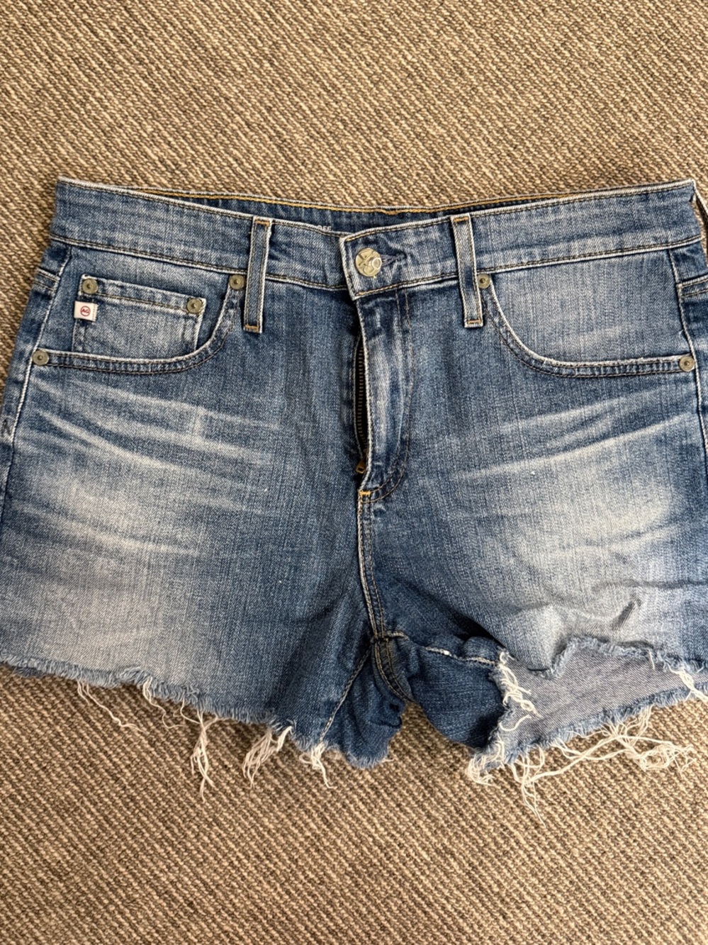 Ag Adriano Goldschmied Faded Light Blue Distressed Cutoff Shorts